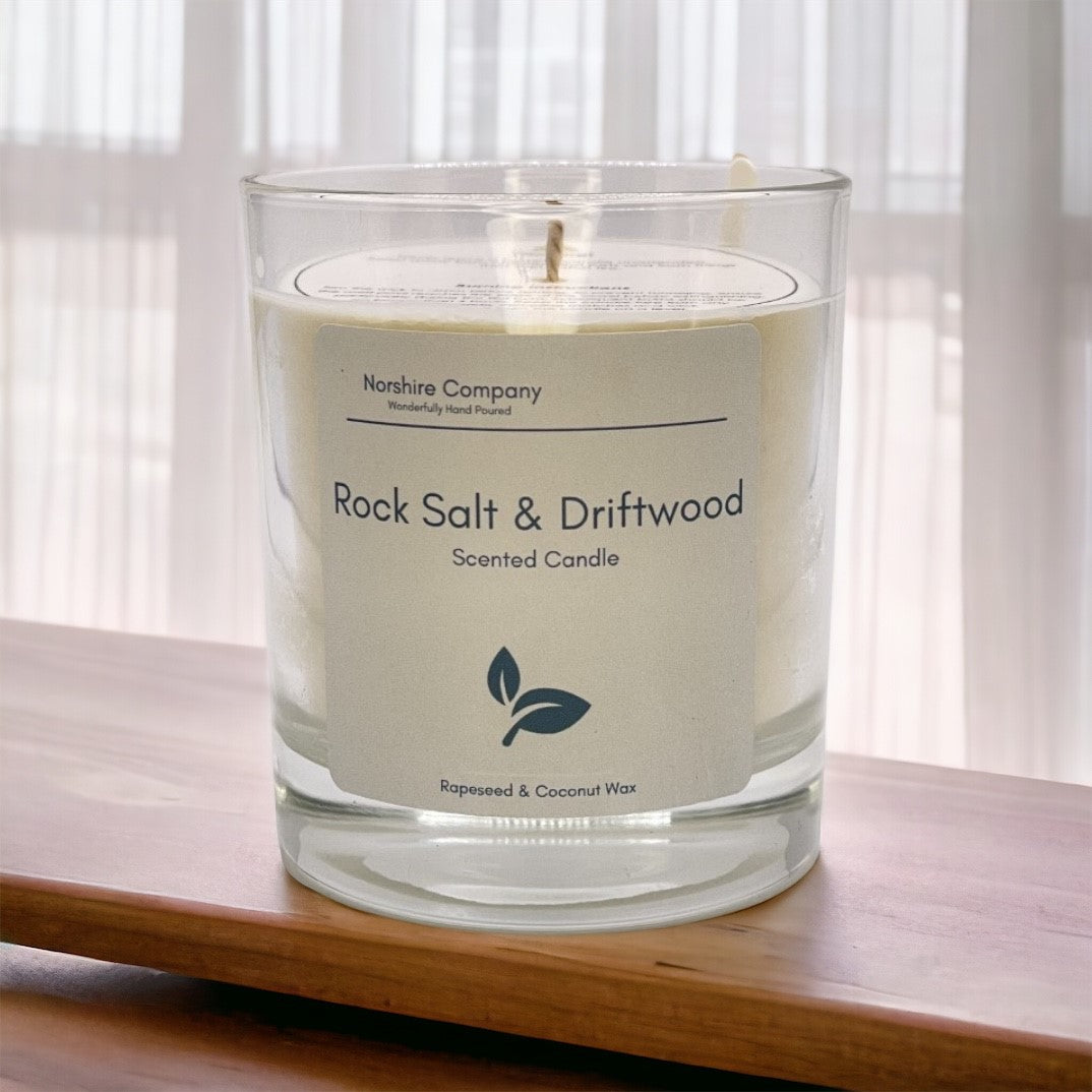 Rock Salt & Driftwood Classic Candle on a Wooden Background | Norshire Company